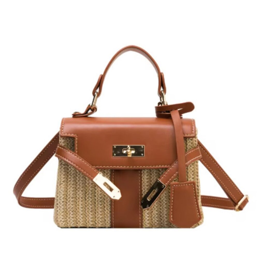 Mini woven brown straw handbag with top handle and crossbody strap